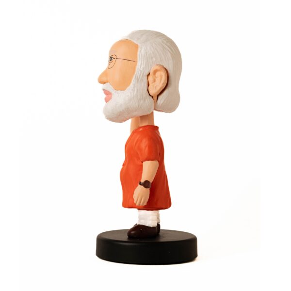 Mantriji Bobblehead side look light orange color