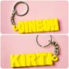 dual name keychain yellow color