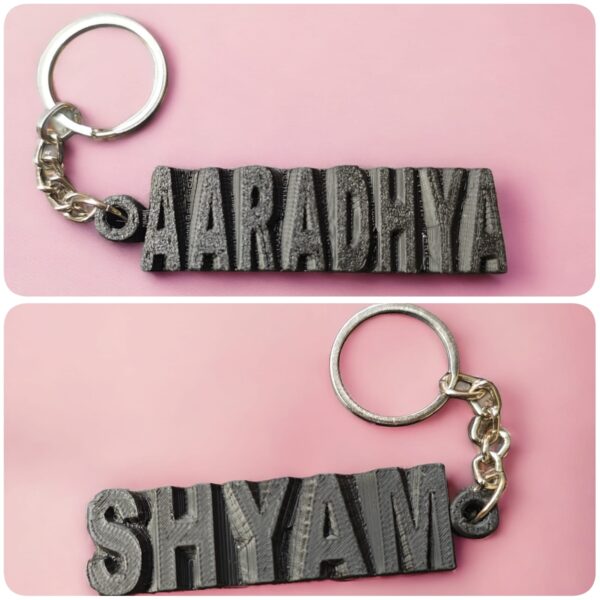 dual name keychain black color